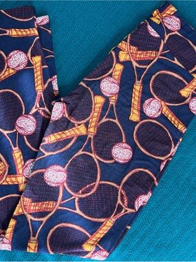 LuLaRoe Navy Leggings with Orange Tennis Racket & Pink Ball Print